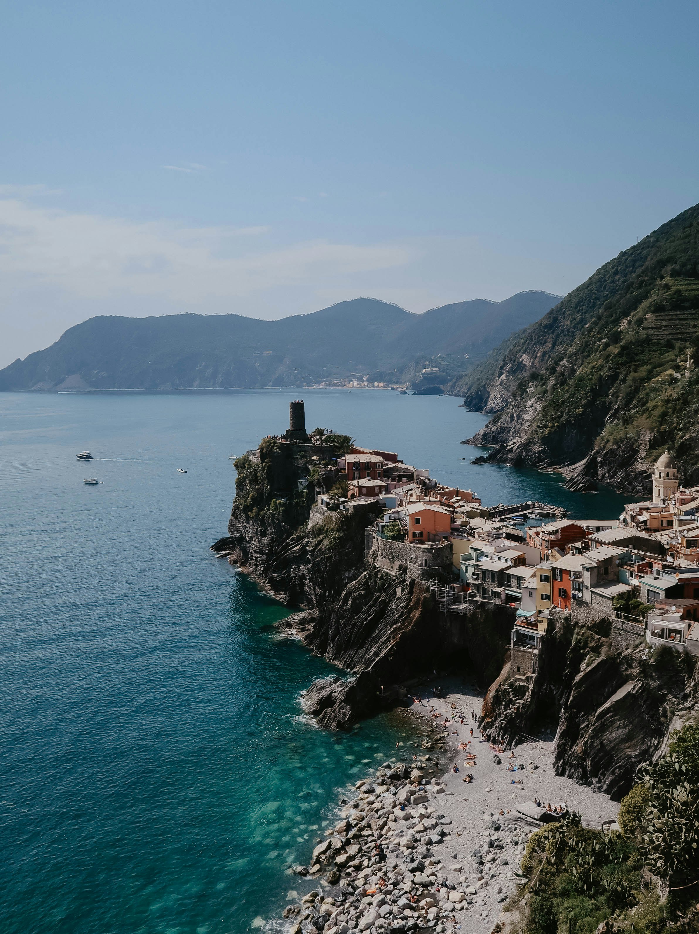 city in mountain next to sea